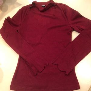 Women’s maroon colored top